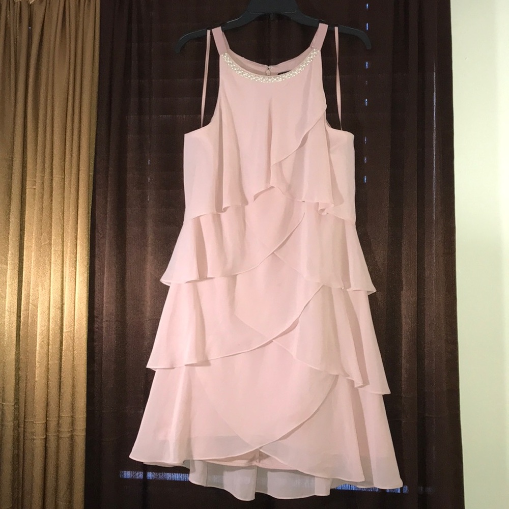 A formal dress for juniors in a pale pale pink